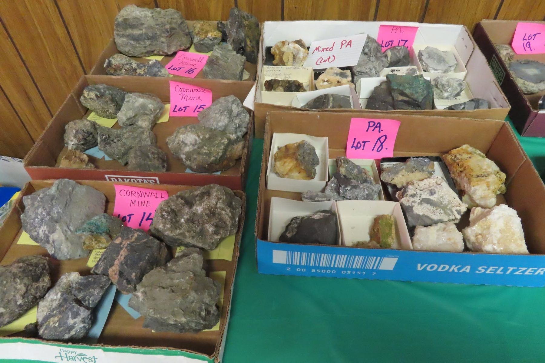 Boxes of labeled Pennsylvania mineral specimens set out as auction lots