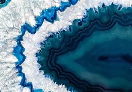 Blue agate geode with a crystal-lined center